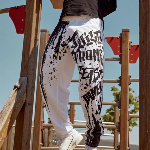 Pantalones deportivos de otoño con estampado de letras, informales, con cintura elástica y transpirables, para entrenar.